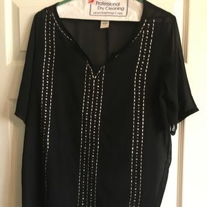 Two piece black top with silver studs.